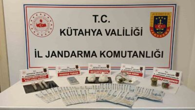 KÜTAHYA’DA EVİNDE UYUŞTURUCU MADDE VE SAHTE PARA ELE GEÇİRİLEN ŞÜPHELİ