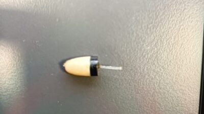 EHLİYET SINAVINDA GÖMLEK DÜĞMESİNDE KAMERA KULAĞINA BÖCEK YERLEŞTİRMİŞ