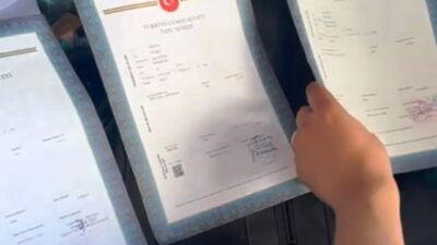 KÜTAHYA'DA POLİSİ, GAYRİMENKUL DOLANDIRICILIĞI OPERASYONUNDA 7 ŞÜPHELİYİ GÖZALTINA ALDI.